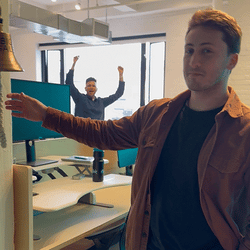 Will & Christian ringing the big sale bell in NYC office